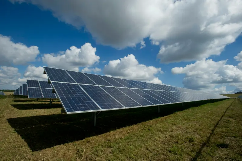 Rows of solar panels at a large solar plant